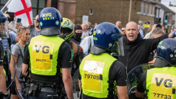 Essex Police bussing claims, Epping migrant hotel protest, counter-protest escort denial, unrest Bell Hotel Essex, Nigel Farage Essex Police controversy.